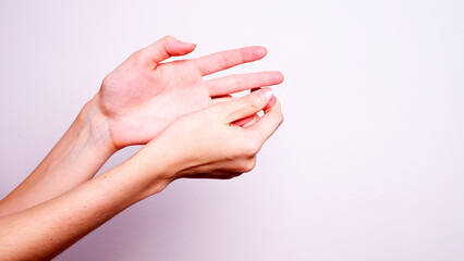 woman holds her hand - pain concept