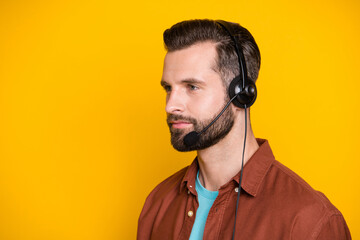 Side profile photo portrait of confident call center assistant worker in headphones microphone...