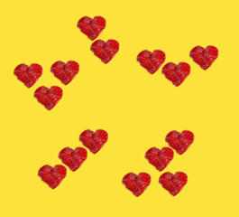 Fototapeta na wymiar Abstract asymmetric frame of red hearts with blurred white pattern, yellow background, minimal, copy space for Valentines day, romantic holiday