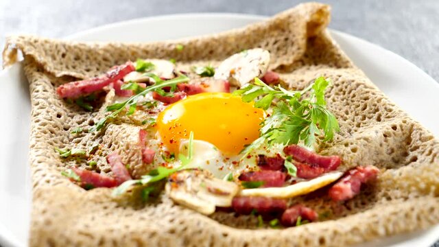 plate with buckwheat crepe and egg