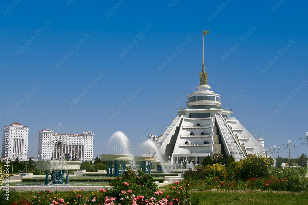 Wall mural White marble-clad fountain that looks like a building in the Independence Park, Ashgabat, Turkmenistan - Wall murals