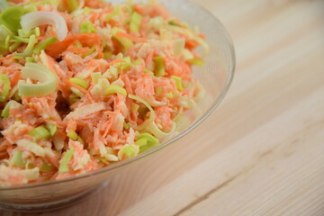 Leek, carrot and apple winter salad, healthy and made of seasonal vegetables