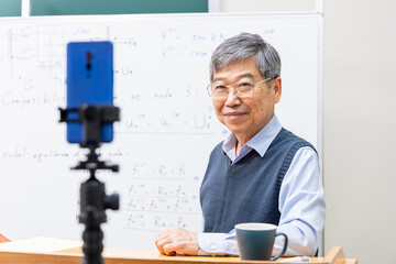 male professor teaching online