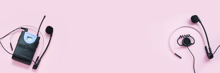 Translation center. Set for telemarketing. Manager customer. Listening operator. Flatlay. Person multi language translator. Pink color background. Multy guide. Speakers device. Conference equipment