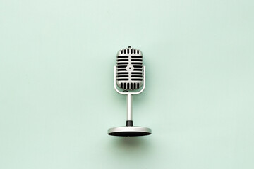 Retro style microphone. Aydio recording background. Top view