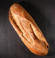 french baguette on a dark background, bread