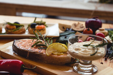 Salmon steak grilled with lemon