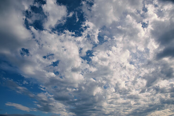 Dramatic sky with white clouds.