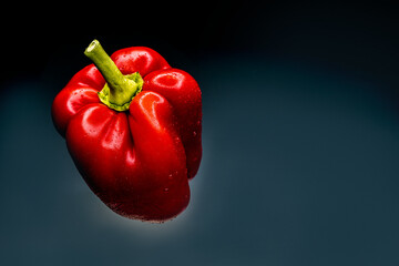  Bell pepper on a dark background on a glass matte table wallpaper 