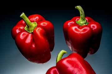  Bell pepper on a dark background on a glass matte table wallpaper 