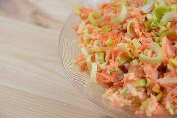 Leek, carrot and apple winter salad, healthy and made of seasonal vegetables