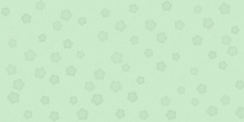 梅の花の透かしの入った緑色の和紙