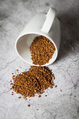 Instant coffee with white cup on gray background