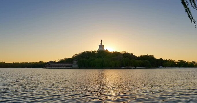 The landmark of Beihai Park in Beijing at sunrise, Beijing landscape in autumn. Zoom in footage (Time-lapse)