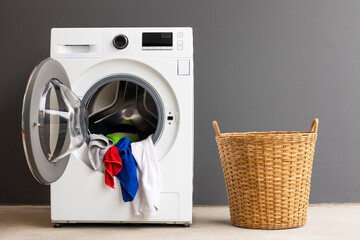 Washing machines and colorful fabrics The washing machine is running set in the house.