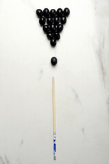 Billiard game made from food and tools for food onthe white surface