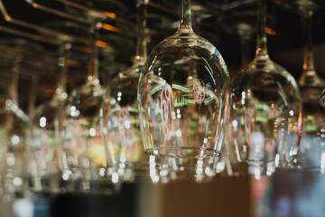 Hanging glasses in night clubs bar.