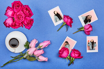 Happy Valentines day. A beautiful bouquet of rose flowers, coffee and lovely picture on blue background
