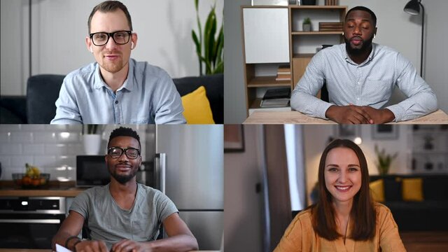 A group of diverse employees, coworkers have video conference, discussing online. Smiling young people talking and looking at webcam during virtual online meeting. Video screens of multiethnic friends