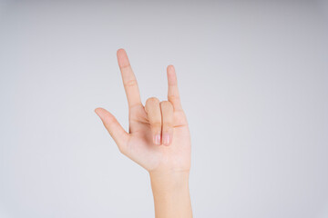 I love you hand sign isolate over white background.
