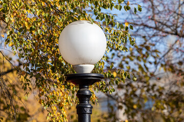 Decorative lantern in the autumn park.