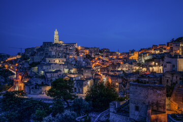 Fototapeta na wymiar Panoramic view of Sasso Barisano historic district in Matera at blue hour, Basilicata, Italy