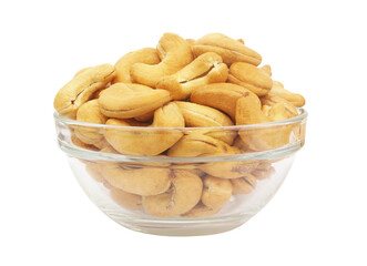 Roasted cashew nuts in glass bowl isolated on white background