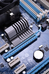 Computer motherboard and electronical components cpu gpu memory and different sockets for video...