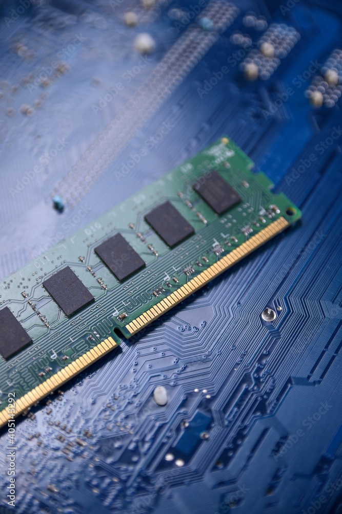 Poster Computer memory RAM on motherboard background . Close up. system, main memory, random access memory, onboard, computer detail. Computer components . DDR3. DDR4. DDR5