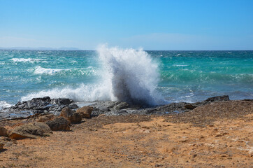 Mallorca, Spain, rocky coast near the beach Es Trenc in the district of Campos in the South of the Balearic island, wavy mediterranean sea