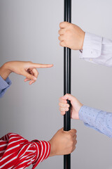 People hands grabbing a pole in a train isolate over white background.