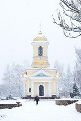 Fototapeta premium Christian chapel under the snow in the city.