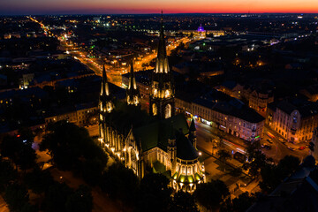Fototapeta premium Aerial veiw on Elizabeth church in Lviv, Ukraine from drone at night