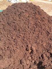 Clean soil for cultivation. The potting soil or peat is suitable for gardening and is one of the four natural elements.