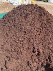 Clean soil for cultivation. The potting soil or peat is suitable for gardening and is one of the four natural elements.