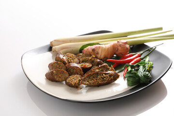 Local Northern Thai food , Northern Thai spicy sausage street food isolated in white background