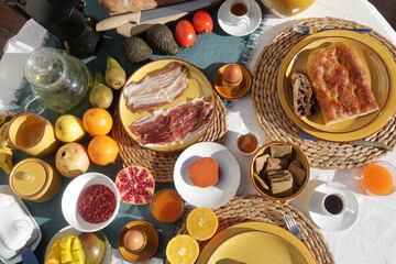 brunch with artichokes mussels croissants fruits brocoli feta salad ham bread and many other food and drink