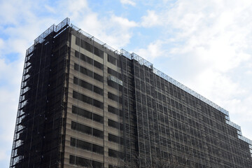 Fototapeta na wymiar Exterior maintenance of a tall building