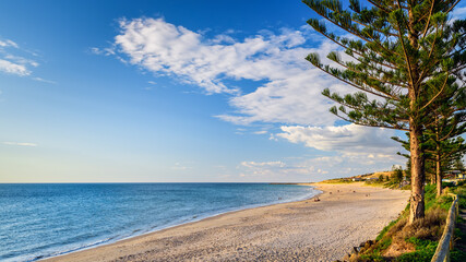Christies Beach view with people at sunset during a warm summer evening, South Australia