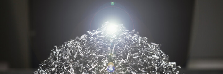 Close up of pile of metal waste lying on floor after some construction work indoors