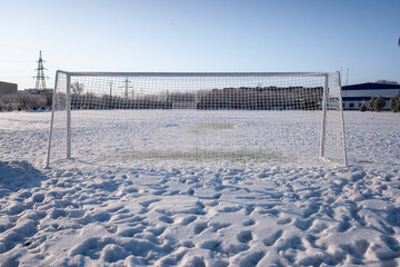 football field in winter frozen net