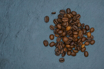 roasted coffee beans on dark background	