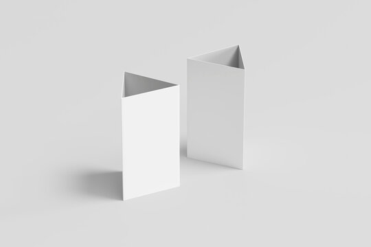 Blank Table Tent. Paper vertical triangle cards on white background with reflections. Mockup. 3D rendering.