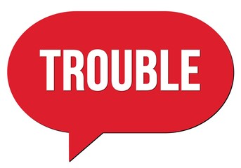 TROUBLE text written in a red speech bubble