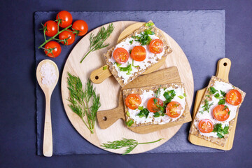 Healthy sandwiches from whole grain rye crisp bread . The concept of healthy eating. Top view