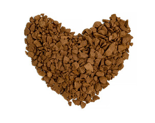 Instant coffee powder with heart shaped isolated on white background
