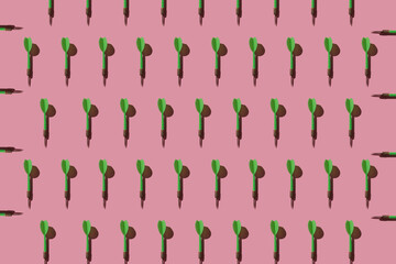 Pattern, dart for playing darts on a pink background