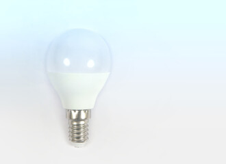 Light bulb LED on a colored background.