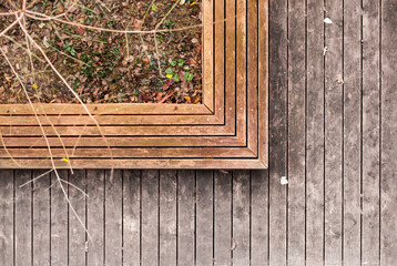 Wooden terrace with tree. Holzterrasse mit Baum.