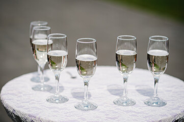 Glasses of champagne on table. Party and holiday celebration concept.
